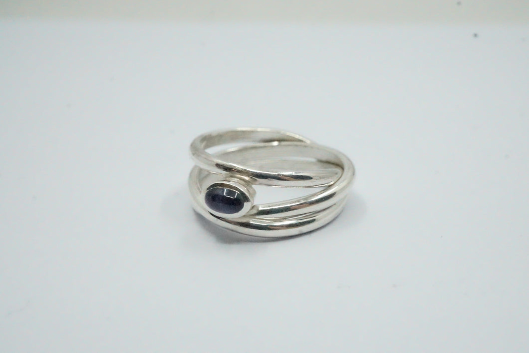 Nest ring three strand with oval 6x3mm blue iolite