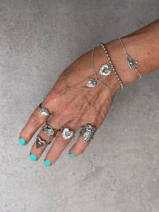 Tiny bug heart bracelet