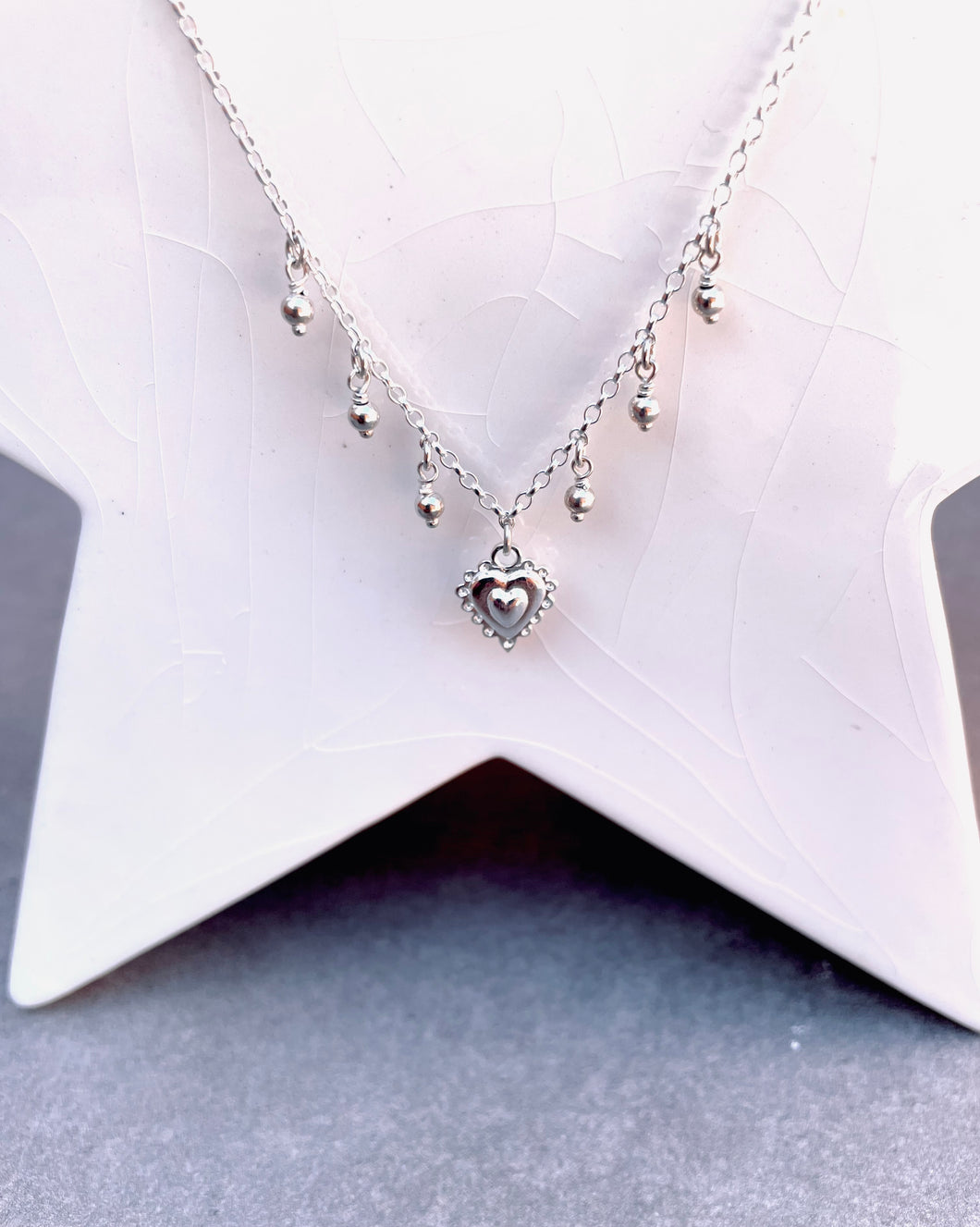 Baby heart with droplets