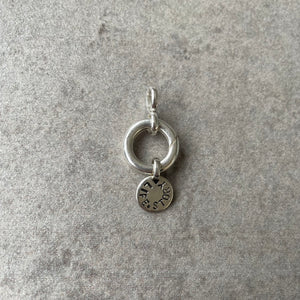 LifeStory "starter", 15mm diameter chunky silver bale to hold charms, 7mm bale to hold chain, 10mm flat round silver disc with the lettering "LIFESTORY" around the circumference